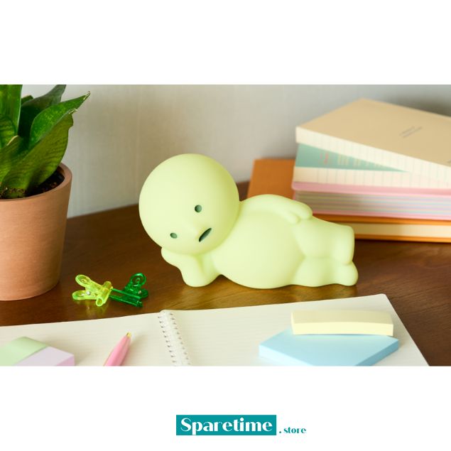 Cute ghost-shaped night light on a desk with stationery items and a plant. SMISKI Touch Light vol.2

