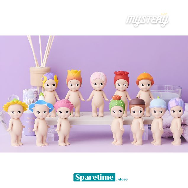 A group of small blind-box style figurines with pale skin and colorful hair/clothing, arranged on a white shelf against a lavender background. The image includes a &