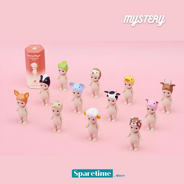 A group of small blind-box style figurines wearing animal-inspired hats and outfits, arranged on a soft pink studio background with the product box visible behind them. The image includes the words &